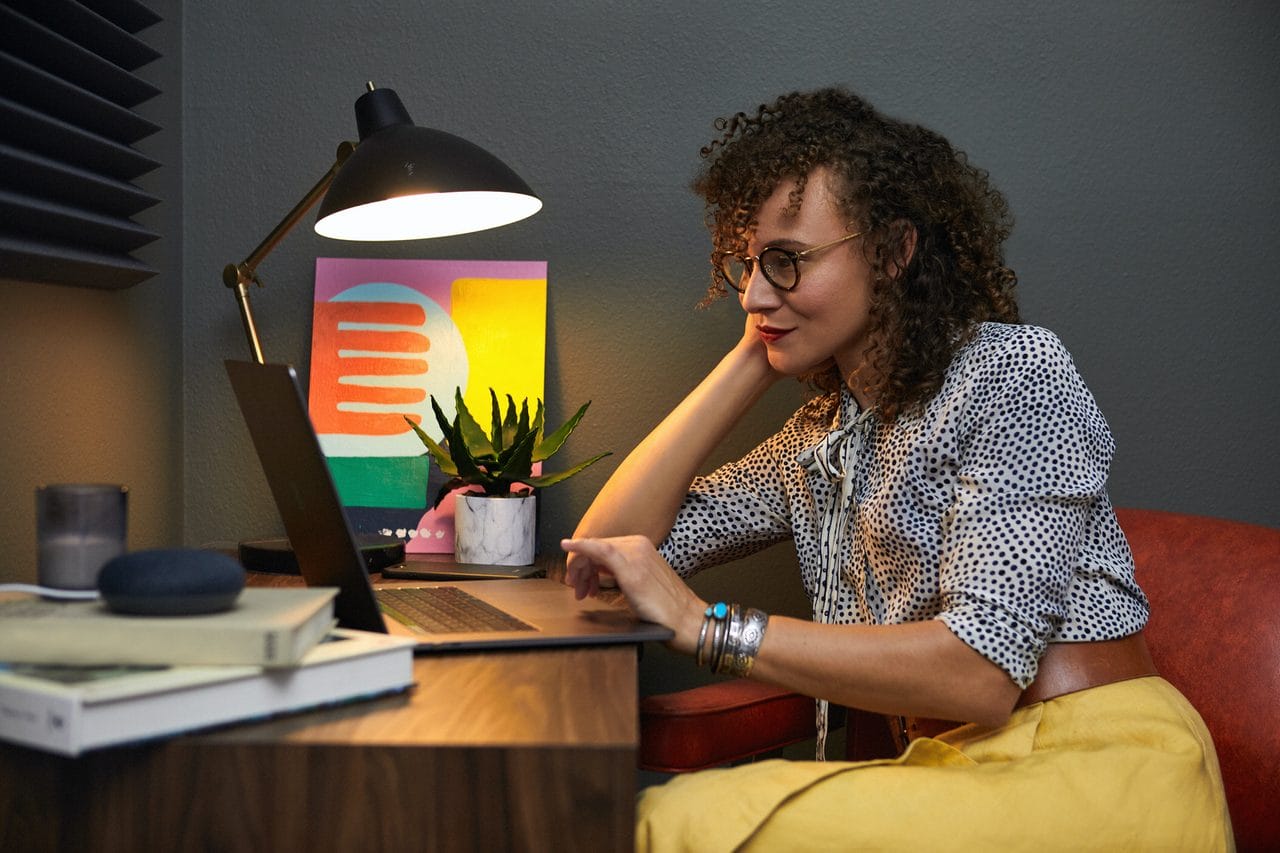 woman looking at lap top