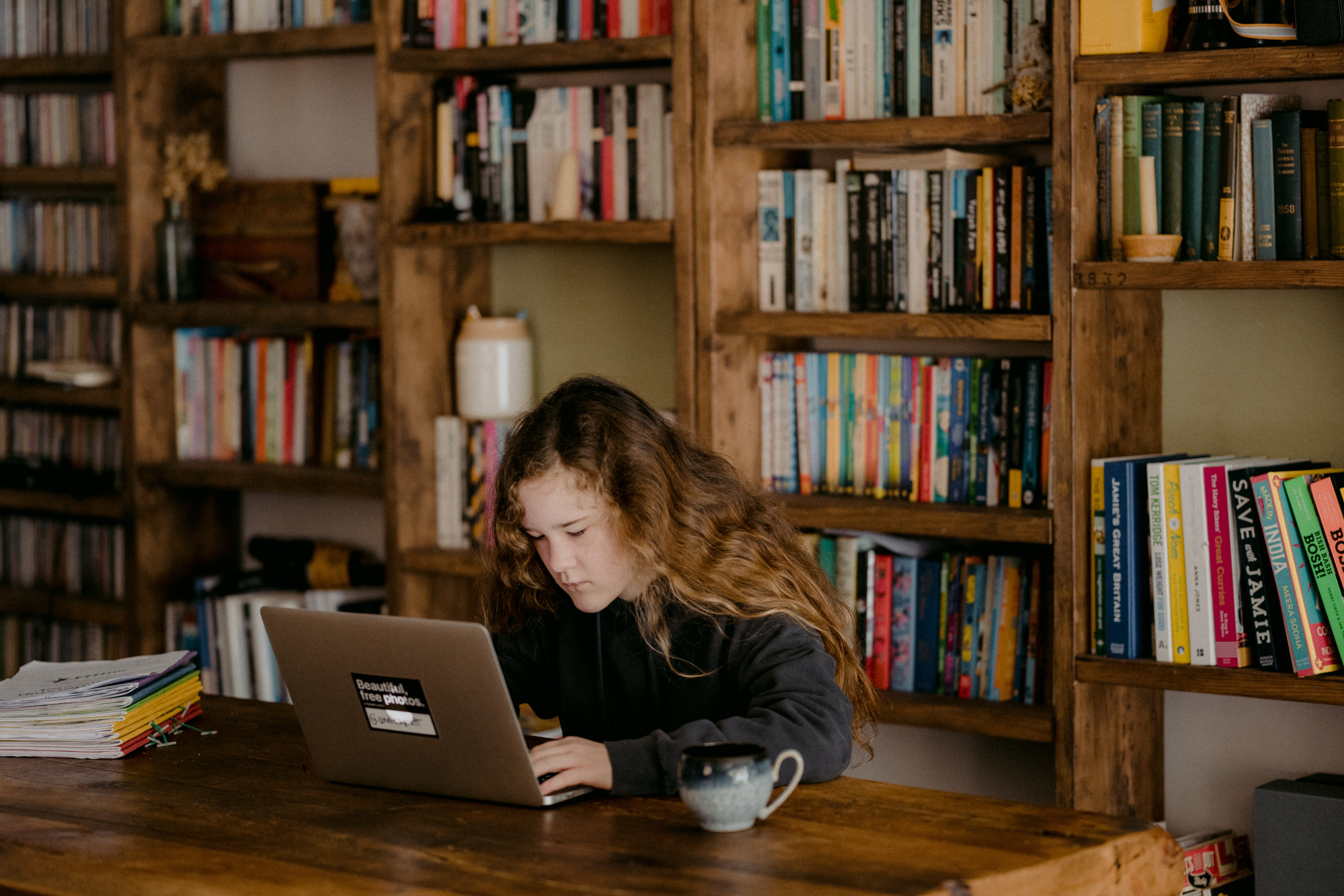 Teen on a Laptop, Cover Photo for How To Make Money Fast As A Kid: 25+ Proven Strategies (+ tips)