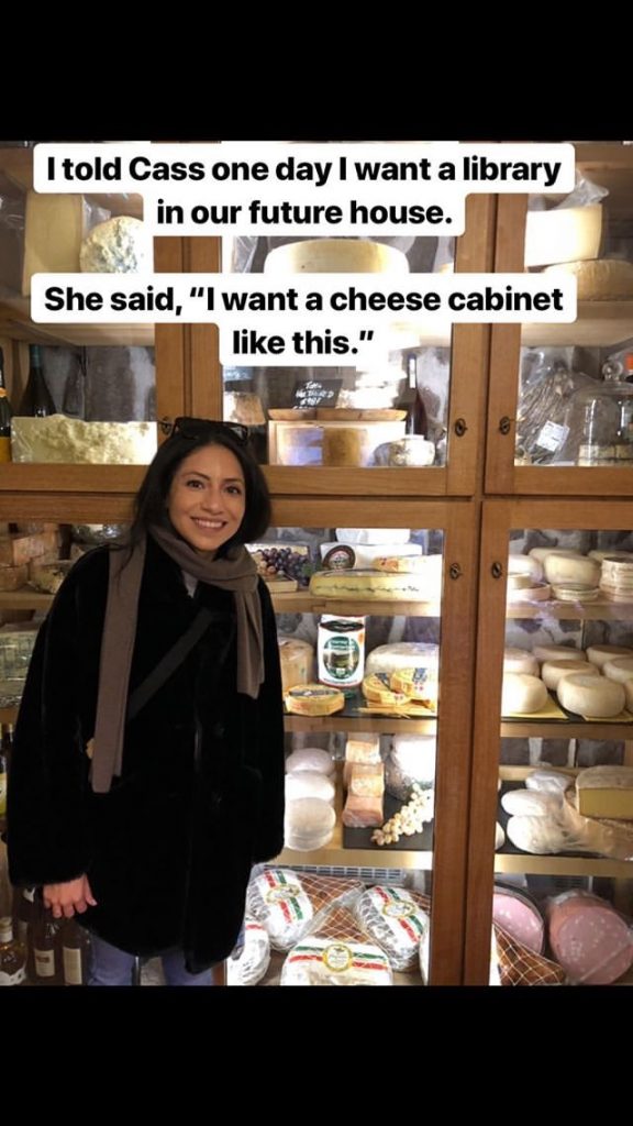 Cass in front of Giant Italian Cheese Cabinet