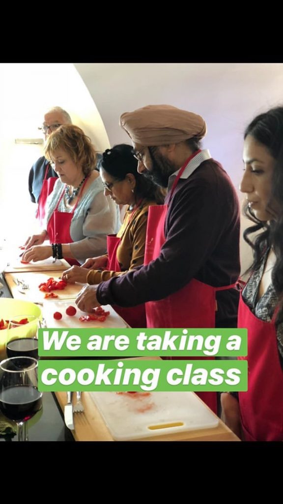 Ramit and his family taking a cooking class in Italy