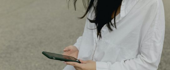 woman looking at her phone