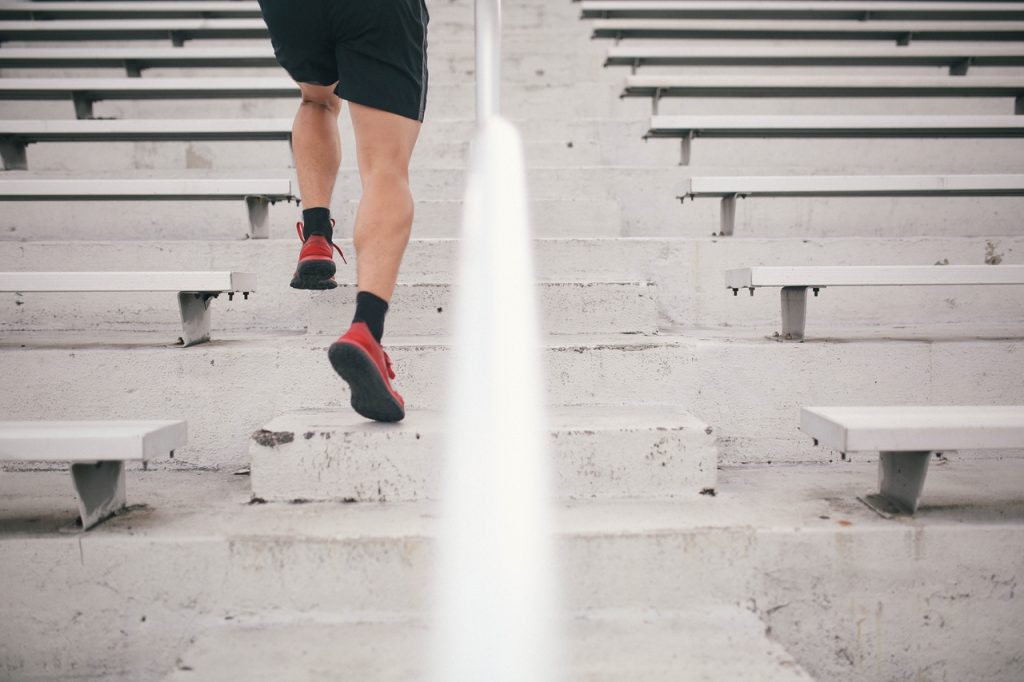 Man running up stairs