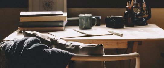 writing desk with books on it