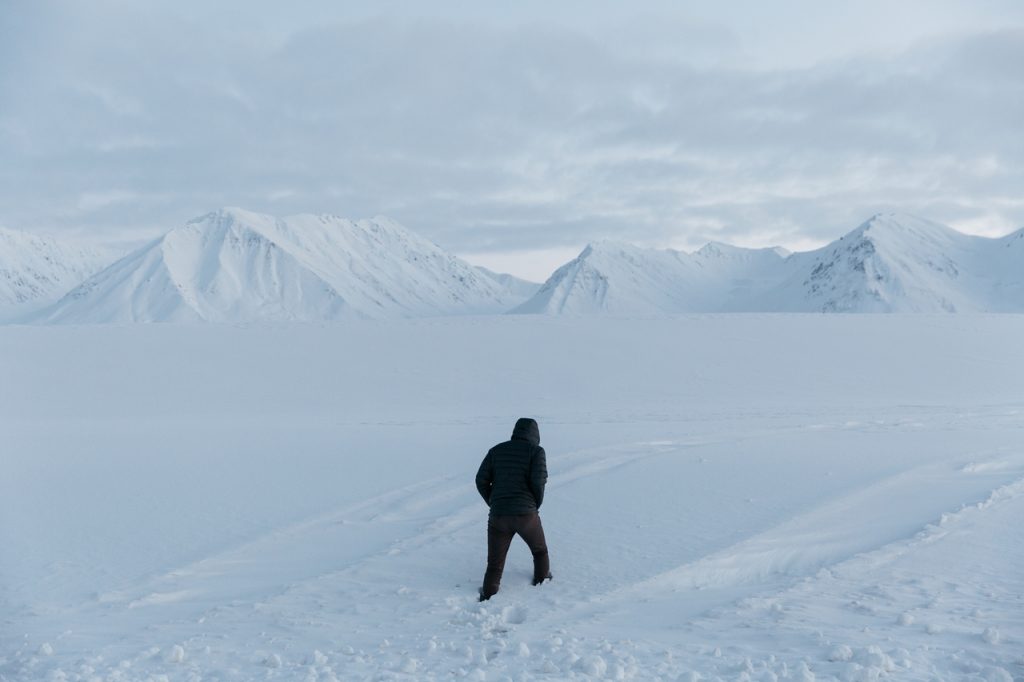 person walking in the snow