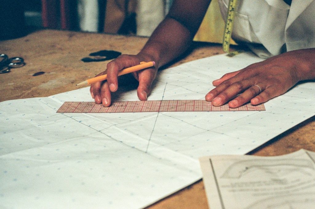 person drawing a graph