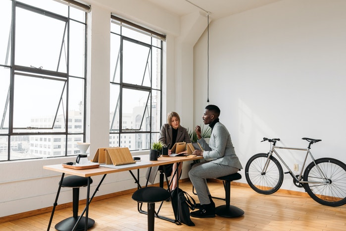 2 people working in an office