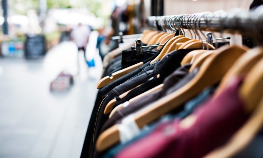 A Rack Of Clothes On A Street