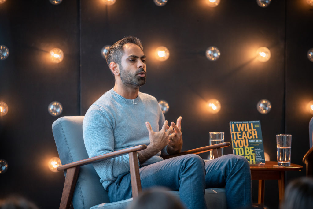 Ramit Sethi speaking onstage
