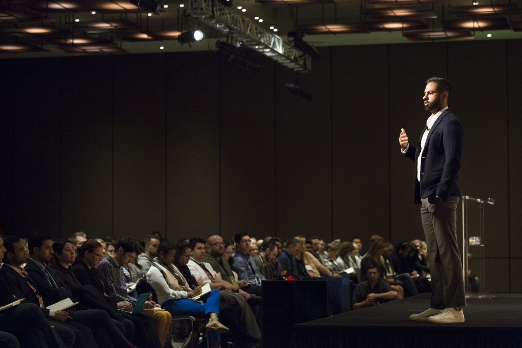 Ramit Sethi talking to a crowd