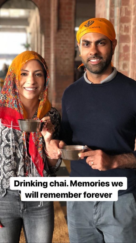 Ramit and Cass drinking Chai