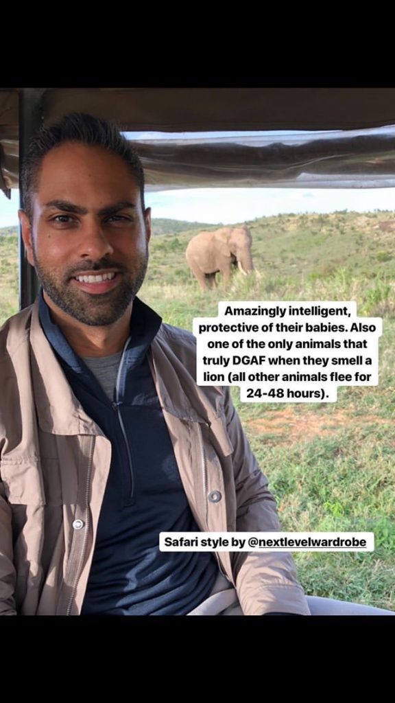 Ramit smiling with elephant in the background in Kenya
