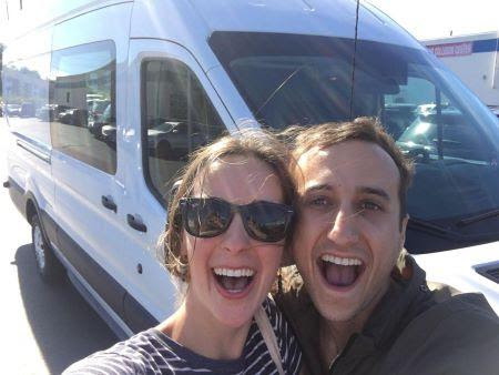 jonathan and lucy in front of their camper van