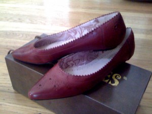 Red women's shoes Susan sold on eBay