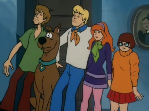 The scooby doo gang looking surprised